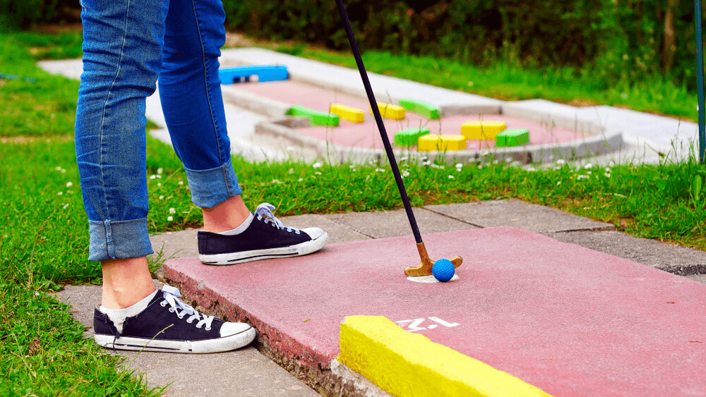 Photo of a Person Playing Mini-Golf near Old Saybrook, CT.