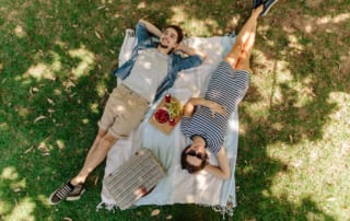 A couple enjoy a nice romantic picnic, one of the many things to do in Old Saybrook, CT while staying at Saybrook Point.